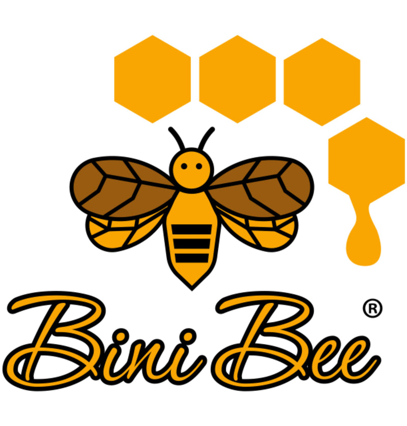 Beekeeper wearing protective suit, gloves, jacket, veil, tools